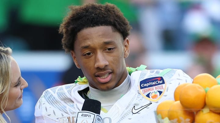Jan 1, 2026; Miami Gardens, FL, USA; Oregon Ducks defensive back Brandon Finney (4) is interviewed by. ESPN’s Katie George following the 2025 Orange Bowl and quarterfinal game of the College Football Playoff against the Texas Tech Red Raiders at Hard Rock Stadium. Mandatory Credit: Nathan Ray Seebeck-Imagn Images
