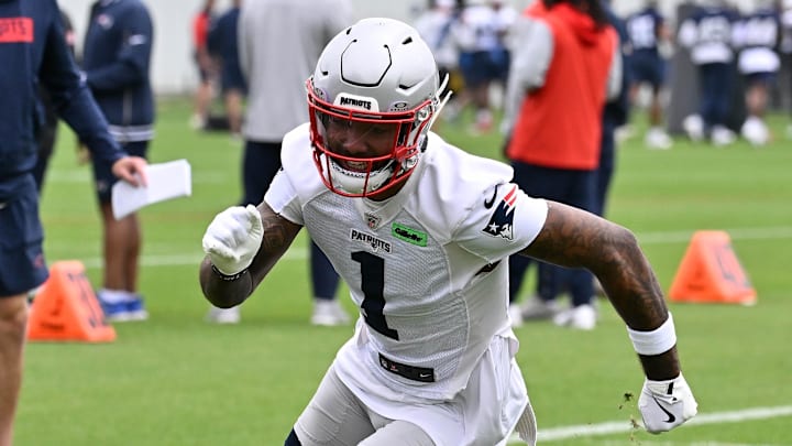 Jun 9, 2025; Foxborough, MA, USA; New England Patriots wide receiver Ja'Lynn Polk (1) runs through a drill during minicamp at Gillette Stadium. Mandatory Credit: Eric Canha-Imagn Images