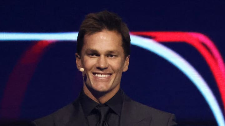 Las Vegas Raiders part-owner Tom Brady smiles