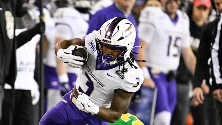 Dec 20, 2025; Eugene, OR, USA; James Madison Dukes running back Wayne Knight (3) rushes during the second quarter against the Oregon Ducks at Autzen Stadium. Mandatory Credit: Troy Wayrynen-Imagn Images