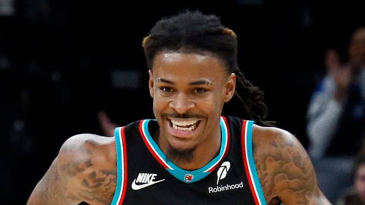 Memphis Grizzlies guard Ja Morant reacts after a basket during the second quarter.