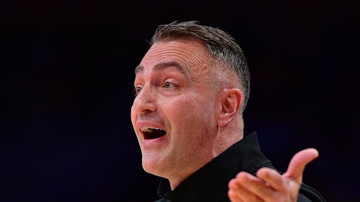Toronto Raptors head coach Darko Rajakovic reacts during the first half.