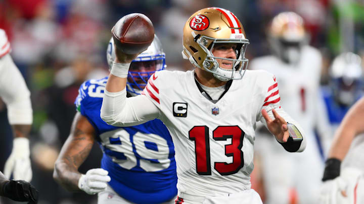 Oct 10, 2024; Seattle, Washington, USA; San Francisco 49ers quarterback Brock Purdy (13) passes the ball against the Seattle Seahawks during the second half at Lumen Field. Oct 10, 2024; Seattle, Washington, USA; San Francisco 49ers quarterback Brock Purdy (13) passes the ball against the Seattle Seahawks during the second half at Lumen Field.