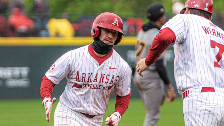 Arkansas Razorbacks third baseman Brent Iredale after a homer against the Missouri Tigers at Baum-Walker Stadium in Fayetteville, Ark.