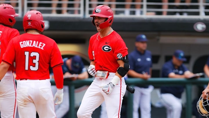 Kolby Branch hits a Grand Slam against UNC Wilimington / Photo UGAA 