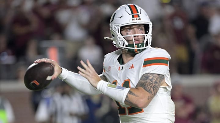Oct 4, 2025; Tallahassee, Florida, USA; Miami Hurricanes quarterback Carson Beck (11) throws during the second half against the Florida State Seminoles at Doak S. Campbell Stadium. Mandatory Credit: Melina Myers-Imagn Images
