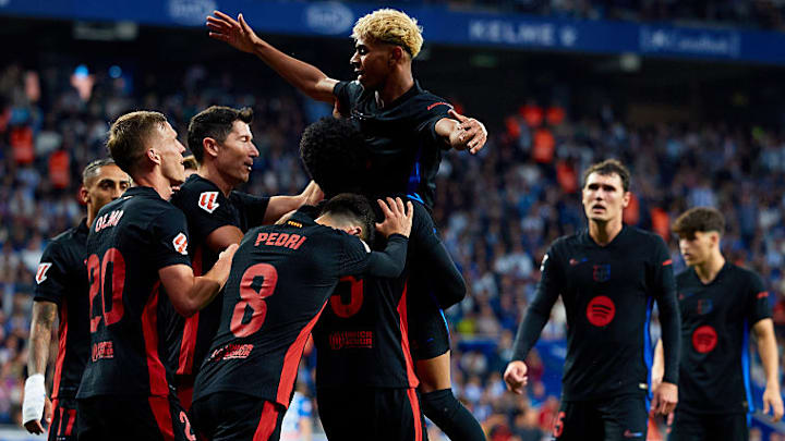 Lamine Yamal's (top middle) goal secured a 28th La Liga trophy for Barcelona.