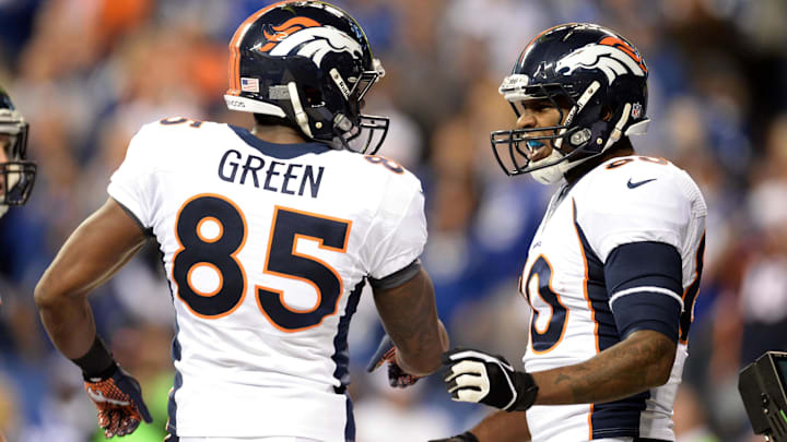 Oct 20, 2013; Indianapolis, IN, USA; Denver Broncos tight end Julius Thomas (80) reacts to his touchdown reception with tight end Virgil Green (85) against the Indianapolis Colts at Lucas Oil Stadium. Mandatory Credit: Ron Chenoy-Imagn Images