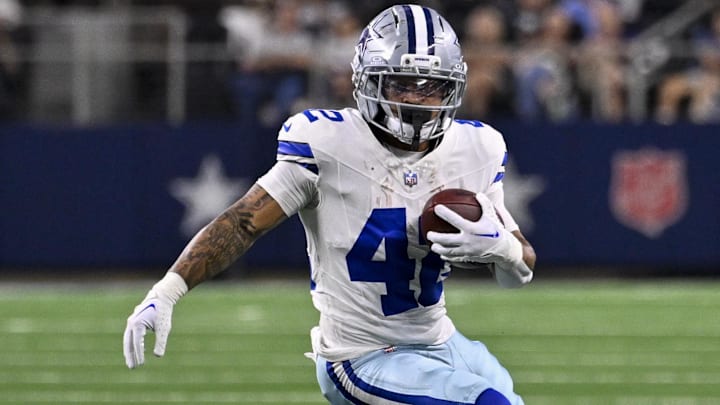 Dallas Cowboys running back Deuce Vaughn (42) runs with the ball during the game between the Dallas Cowboys and the Baltimore Ravens at AT&T Stadium.