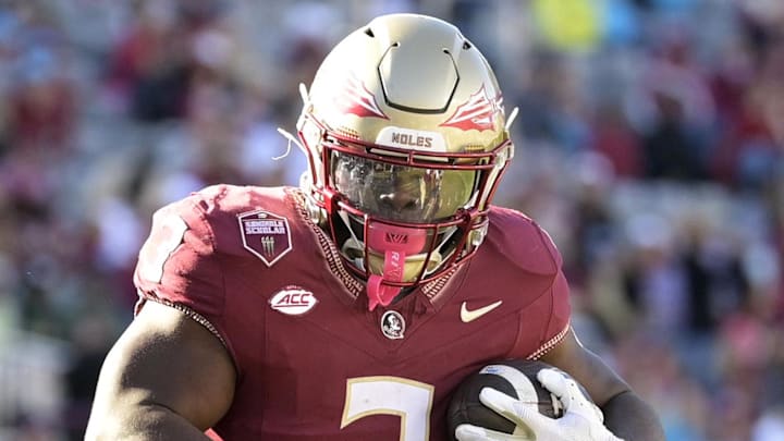 Nov 23, 2024; Tallahassee, Florida, USA; Florida State Seminoles running back Kam Davis (3) runs the ball during the second half of the game against the Charleston Southern Buccaneers at Doak S. Campbell Stadium. Mandatory Credit: Melina Myers-Imagn Images Nov 23, 2024; Tallahassee, Florida, USA; Florida State Seminoles running back Kam Davis (3) runs the ball during the second half of the game against the Charleston Southern Buccaneers at Doak S. Campbell Stadium. Mandatory Credit: Melina Myers-Imagn Images