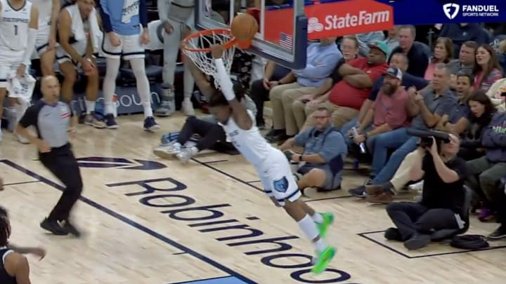 Memphis Grizzlies guard Ja Morant attempts to dunk the ball.