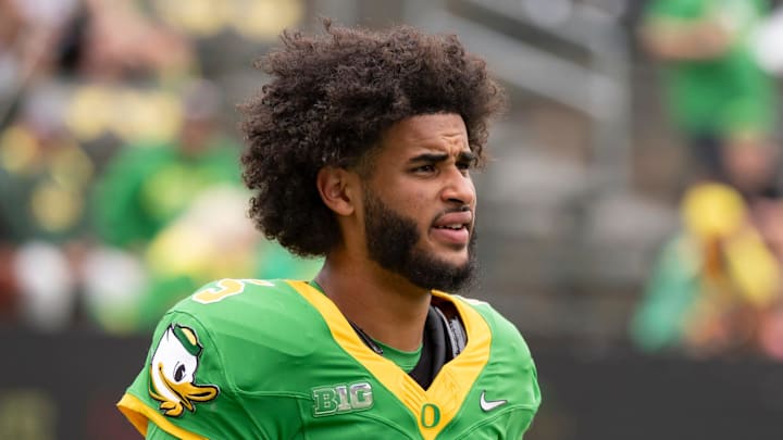 Oregon quarterback Dante Moore warms up as the Oregon Ducks host the Oklahoma State Cowboys on Sept. 6, 2025, at Autzen Stadium in Eugene, Oregon.