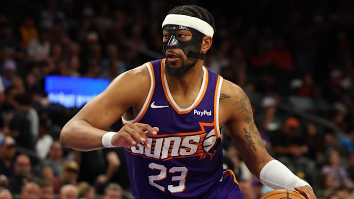 Mar 22, 2026; Phoenix, Arizona, USA; Phoenix Suns guard Jordan Goodwin (23) dribbles down court against the Toronto Raptors during the third quarter at Mortgage Matchup Center. Mandatory Credit: Anna Carrington-Imagn Images