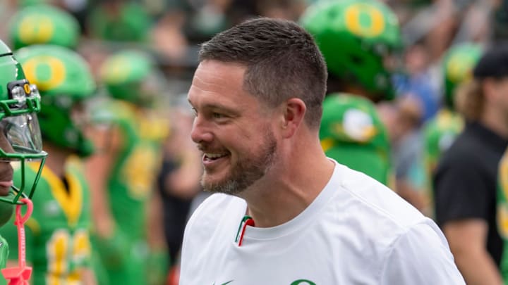 Oregon head coach Dan Lanning, right, talks with Oregon wide receiver Dakorien Moore during warmups as the Oregon Ducks host the Oklahoma State Cowboys on Sept. 6, 2025, at Autzen Stadium in Eugene, Oregon. Oregon head coach Dan Lanning, right, talks with Oregon wide receiver Dakorien Moore during warmups as the Oregon Ducks host the Oklahoma State Cowboys on Sept. 6, 2025, at Autzen Stadium in Eugene, Oregon.