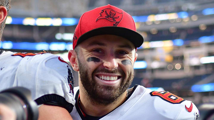 Dec 15, 2024; Inglewood, California, USA; Tampa Bay Buccaneers quarterback Baker Mayfield (6) celebrates the victory against the Los Angeles Chargers at SoFi Stadium. Mandatory Credit: Gary A. Vasquez-Imagn Images