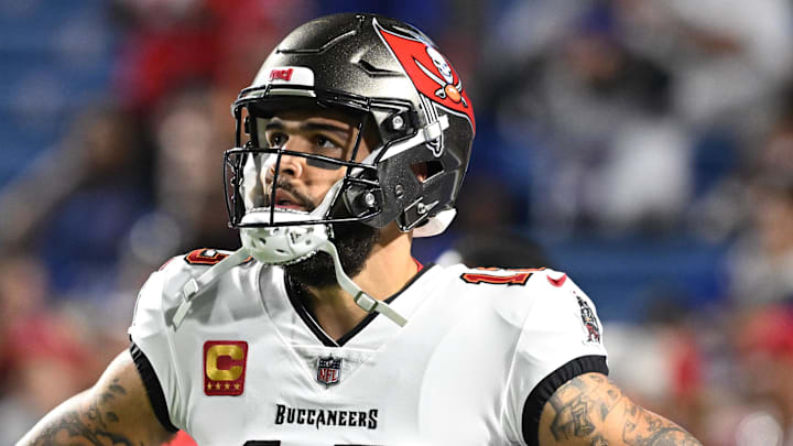 Oct 26, 2023; Orchard Park, New York, USA; Tampa Bay Buccaneers wide receiver Mike Evans (13) warms up before a game against the Buffalo Bills at Highmark Stadium. Mandatory Credit: Mark Konezny-Imagn Images