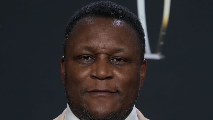 Former NFL running back Barry Sanders poses for a photo on the red carpet before the NFL Honors award show 