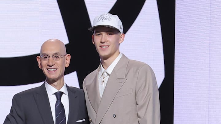 Jun 25, 2025; Brooklyn, NY, USA;  Egor Demin stands with NBA commissioner Adam Silver after being selected as the eighth pick by the Brooklyn Nets in the first round of the 2025 NBA Draft at Barclays Center. Mandatory Credit: Brad Penner-Imagn Images