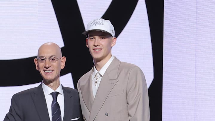 Jun 25, 2025; Brooklyn, NY, USA;  Egor Demin stands with NBA commissioner Adam Silver after being selected as the eighth pick by the Brooklyn Nets in the first round of the 2025 NBA Draft at Barclays Center. Mandatory Credit: Brad Penner-Imagn Images