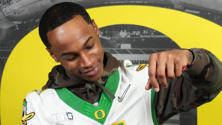 Dec 30, 2024; Los Angeles, CA, USA; Oregon Ducks wide receiver Evan Stewart (7) poses during Rose Bowl media day at Sheraton Grand LA. Mandatory Credit: Kirby Lee-Imagn Images