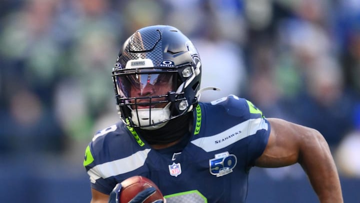 Seattle Seahawks running back Kenneth Walker III running the football.