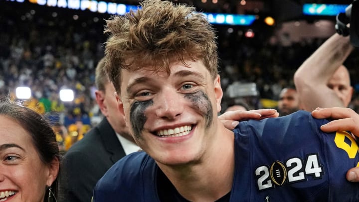 Jan 8, 2024; Houston, TX, USA; Michigan Wolverines quarterback J.J. McCarthy (9) celebrates after
