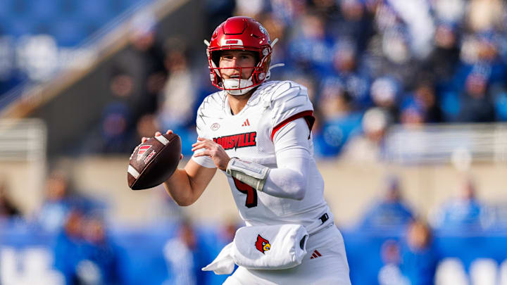 Nov 30, 2024; Lexington, Kentucky, USA; Louisville Cardinals quarterback Tyler Shough (9) looks to pass the ball during the first quarter against the Kentucky Wildcats at Kroger Field. 