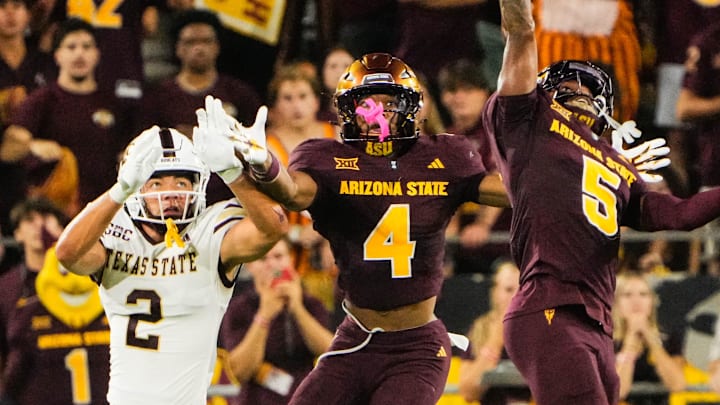 Sep 13, 2025; Tempe, Arizona, USA; Arizona State Sun Devils safety Kyndrich Breedlove (5) breaks up a pass intended for Texas State Bobcats wide receiver Kylen Evans (2) in the second quarter of the game between Arizona State Sun Devils and Texas State Bobcats. Mandatory Credit: Arianna Grainey-Imagn Images