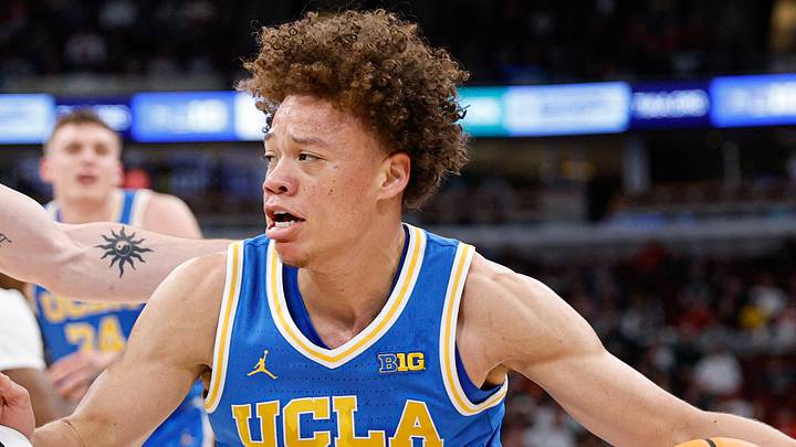 Mar 13, 2026; Chicago, IL, USA; UCLA Bruins guard Trent Perry (0) fouls Michigan State Spartans guard Denham Wojcik (10) during the first half at United Center. Mandatory Credit: Kamil Krzaczynski-Imagn Images Mar 13, 2026; Chicago, IL, USA; UCLA Bruins guard Trent Perry (0) fouls Michigan State Spartans guard Denham Wojcik (10) during the first half at United Center. Mandatory Credit: Kamil Krzaczynski-Imagn Images