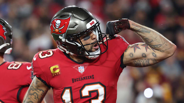 Tampa Bay Buccaneers wide receiver Mike Evans celebrates after a touchdown catch with tight end Cade Otton. Tampa Bay Buccaneers wide receiver Mike Evans celebrates after a touchdown catch with tight end Cade Otton.