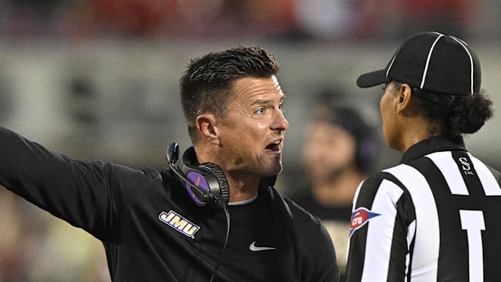 Sep 5, 2025; Louisville, Kentucky, USA; James Madison Dukes head coach Bob Chesney argues a call with an official during the first half against the Louisville Cardinals at L&N Federal Credit Union Stadium. Mandatory Credit: Jamie Rhodes-Imagn Images Sep 5, 2025; Louisville, Kentucky, USA; James Madison Dukes head coach Bob Chesney argues a call with an official during the first half against the Louisville Cardinals at L&N Federal Credit Union Stadium. Mandatory Credit: Jamie Rhodes-Imagn Images