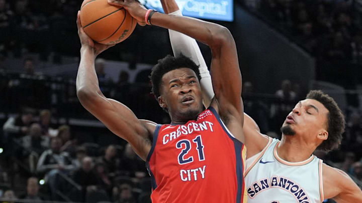 Dec 8, 2024; San Antonio, Texas, USA;  New Orleans Pelicans center Yves Missi (21) goes up against San Antonio Spurs center Victor Wembanyama (1) in the first half at Frost Bank Center. Mandatory Credit: Daniel Dunn-Imagn Images