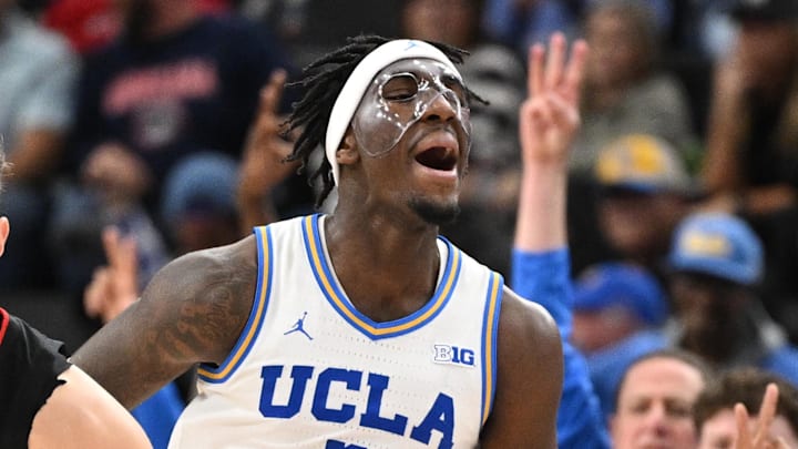 Dec 28, 2024; Inglewood, California, USA; UCLA Bruins guard Eric Dailey Jr. (3) celebrates hitting a 3-point jumper during the second half against the Gonzaga Bulldogs at Intuit Dome. Left is Gonzaga Bulldogs forward Ben Gregg (33). Mandatory Credit: Robert Hanashiro-Imagn Images Dec 28, 2024; Inglewood, California, USA; UCLA Bruins guard Eric Dailey Jr. (3) celebrates hitting a 3-point jumper during the second half against the Gonzaga Bulldogs at Intuit Dome. Left is Gonzaga Bulldogs forward Ben Gregg (33). Mandatory Credit: Robert Hanashiro-Imagn Images