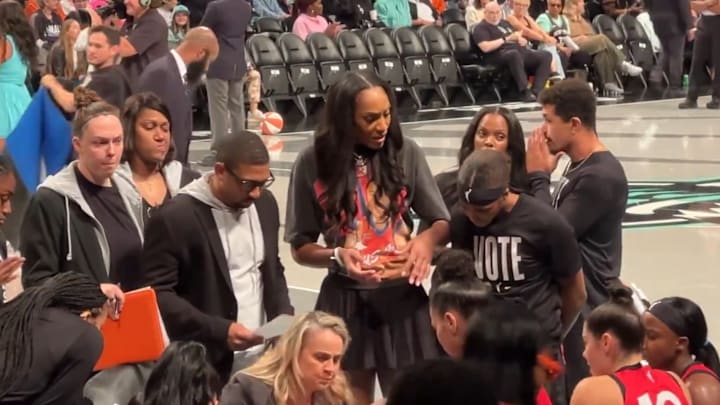 Wilson and Colson talking during a Las Vegas Aces timeout. Wilson and Colson talking during a Las Vegas Aces timeout.
