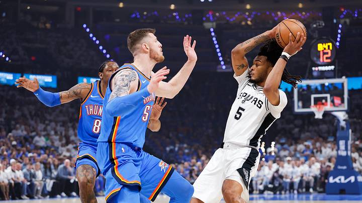 May 20, 2026; Oklahoma City, Oklahoma, USA; San Antonio Spurs guard Stephon Castle (5) looks to pass as Oklahoma City Thunder center Isaiah Hartenstein (55) defends during the first quarter during Game 2 of the Western Conference Finals for the 2026 NBA Playoffs at Paycom Center. May 20, 2026; Oklahoma City, Oklahoma, USA; San Antonio Spurs guard Stephon Castle (5) looks to pass as Oklahoma City Thunder center Isaiah Hartenstein (55) defends during the first quarter during Game 2 of the Western Conference Finals for the 2026 NBA Playoffs at Paycom Center.