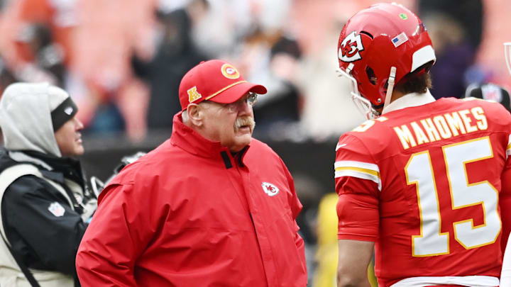Dec 15, 2024; Cleveland, Ohio, USA; Kansas City Chiefs head coach Andy Reid talks to quarterback Patrick Mahomes (15) before the game between the Cleveland Browns and the Chiefs at Huntington Bank Field. Mandatory Credit: Ken Blaze-Imagn Images