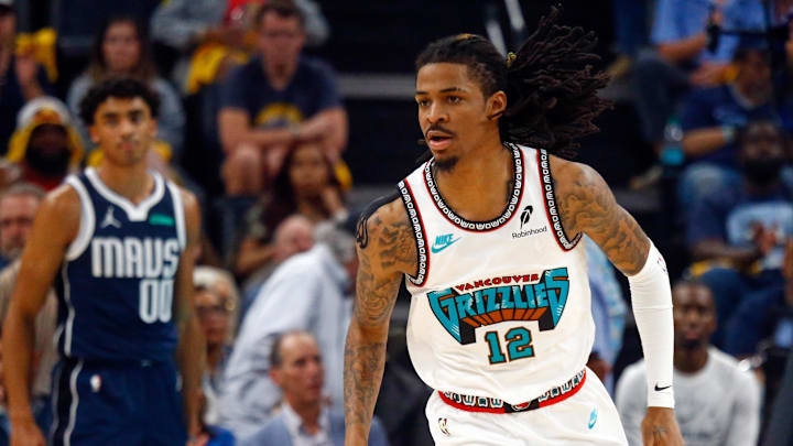 Apr 18, 2025; Memphis, Tennessee, USA; Memphis Grizzlies guard Ja Morant (12) reacts during the second quarter against the Dallas Mavericks at FedExForum. Apr 18, 2025; Memphis, Tennessee, USA; Memphis Grizzlies guard Ja Morant (12) reacts during the second quarter against the Dallas Mavericks at FedExForum.