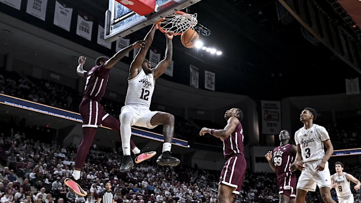 Jan 21, 2026; College Station, Texas, USA; Texas A&M Aggies forward Rashaun Agee (12) dunks the ball during the first half against the Mississippi State Bulldogs at Reed Arena. Mandatory Credit: Maria Lysaker-Imagn Images 