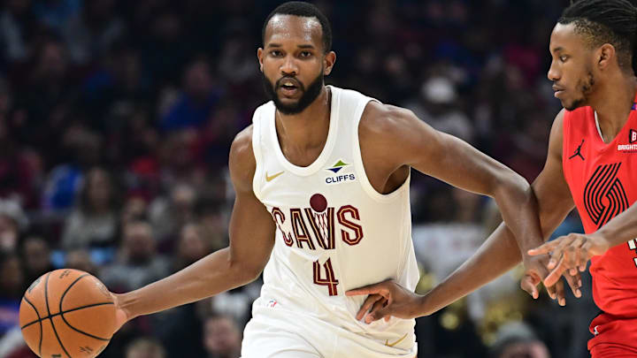 Mar 2, 2025; Cleveland, Ohio, USA; Cleveland Cavaliers forward Evan Mobley (4) brings the ball up court against Portland Trail Blazers forward Jabari Walker (34) during the first half at Rocket Arena. Mandatory Credit: Ken Blaze-Imagn Images Mar 2, 2025; Cleveland, Ohio, USA; Cleveland Cavaliers forward Evan Mobley (4) brings the ball up court against Portland Trail Blazers forward Jabari Walker (34) during the first half at Rocket Arena. Mandatory Credit: Ken Blaze-Imagn Images