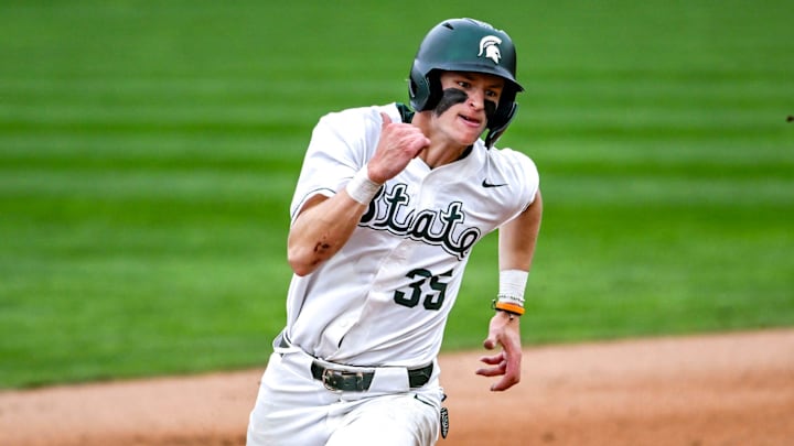 Michigan State's Randy Seymour rounds third base on his way to a score against Ohio State during the fourth inning on Friday, April 18, 2025, at McLane Stadium in East Lansing.