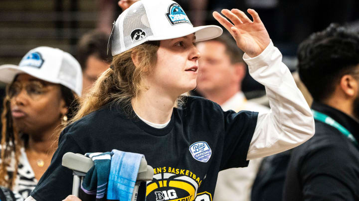 Iowa guard Molly Davis (1) adjusts her Big Ten Tournament championship hat after the Big Ten Tournament championship game at the Target Center on Sunday, March 10, 2024, in Minneapolis, Minn.