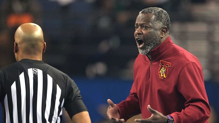 Feb 15, 2025; Oakland, CA, USA; Tuskegee Golden Tigers head coach Benjy Taylor yells during the first half of the All Star-HBCU game against the Morehouse Maroon Tigers at Oakland Arena. Mandatory Credit: Darren Yamashita-Imagn Images Feb 15, 2025; Oakland, CA, USA; Tuskegee Golden Tigers head coach Benjy Taylor yells during the first half of the All Star-HBCU game against the Morehouse Maroon Tigers at Oakland Arena. Mandatory Credit: Darren Yamashita-Imagn Images