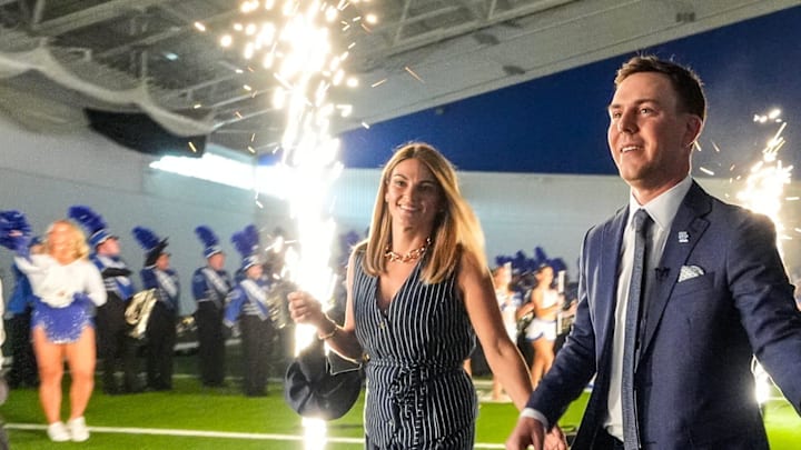 New Kentucky Wildcat head coach Will Stein arrives with wife, Darby has he is introduced at Kentucky on Wednesday, December 3, 2025 New Kentucky Wildcat head coach Will Stein arrives with wife, Darby has he is introduced at Kentucky on Wednesday, December 3, 2025