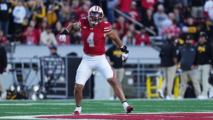 Oct 11, 2025; Madison, Wisconsin, USA; Wisconsin Badgers linebacker Tackett Curtis (4) celebrates a defensive stop against the Iowa Hawkeyes in the first quarter at Camp Randall Stadium Oct 11, 2025; Madison, Wisconsin, USA; Wisconsin Badgers linebacker Tackett Curtis (4) celebrates a defensive stop against the Iowa Hawkeyes in the first quarter at Camp Randall Stadium