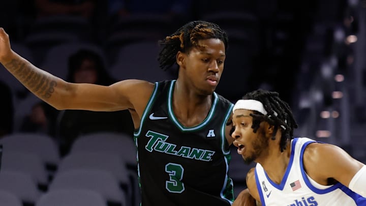 Mar 15, 2025; Fort Worth, TX, USA; Memphis Tigers guard Colby Rogers (3) controls the ball as Tulane Green Wave guard Kam Williams (3) defends during the first half at Dickies Arena. Mandatory Credit: Chris Jones-Imagn Images