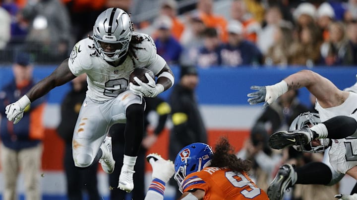 Nov 6, 2025; Denver, Colorado, USA; Las Vegas Raiders running back Ashton Jeanty (2) rushes the ball against the Denver Broncos during the first half at Empower Field at Mile High. Mandatory Credit: Isaiah J. Downing-Imagn Images Nov 6, 2025; Denver, Colorado, USA; Las Vegas Raiders running back Ashton Jeanty (2) rushes the ball against the Denver Broncos during the first half at Empower Field at Mile High. Mandatory Credit: Isaiah J. Downing-Imagn Images