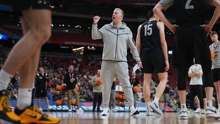 Purdue head coach Matt Painter instructs his team during practice at State Farm Stadium. Purdue head coach Matt Painter instructs his team during practice at State Farm Stadium.