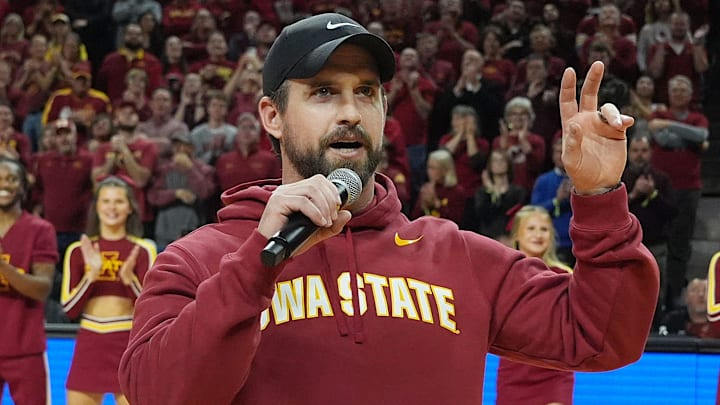 Iowa State football coach Jimmy Rogers speaks during a timeout in the Cy-Hawk men's basketball game on Dec. 11, 2025, at Hilton Coliseum in Ames.