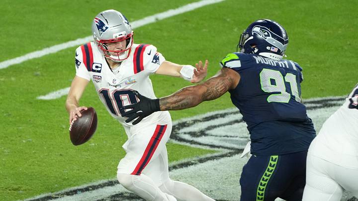 Feb 8, 2026; Santa Clara, CA, USA; New England Patriots quarterback Drake Maye (10) is pressured by Seattle Seahawks defensive tackle Byron Murphy II (91) in the second half in Super Bowl LX at Levi's Stadium. Mandatory Credit: Kirby Lee-Imagn Images Feb 8, 2026; Santa Clara, CA, USA; New England Patriots quarterback Drake Maye (10) is pressured by Seattle Seahawks defensive tackle Byron Murphy II (91) in the second half in Super Bowl LX at Levi's Stadium. Mandatory Credit: Kirby Lee-Imagn Images