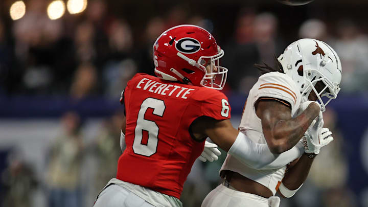 Dec 7, 2024; Atlanta, GA, USA; Georgia Bulldogs defensive back Daylen Everette (6) breaks up a pass intended for Texas Longhorns wide receiver Isaiah Bond (7) during the first half in the 2024 SEC Championship game at Mercedes-Benz Stadium. Mandatory Credit: Brett Davis-Imagn Images Dec 7, 2024; Atlanta, GA, USA; Georgia Bulldogs defensive back Daylen Everette (6) breaks up a pass intended for Texas Longhorns wide receiver Isaiah Bond (7) during the first half in the 2024 SEC Championship game at Mercedes-Benz Stadium. Mandatory Credit: Brett Davis-Imagn Images